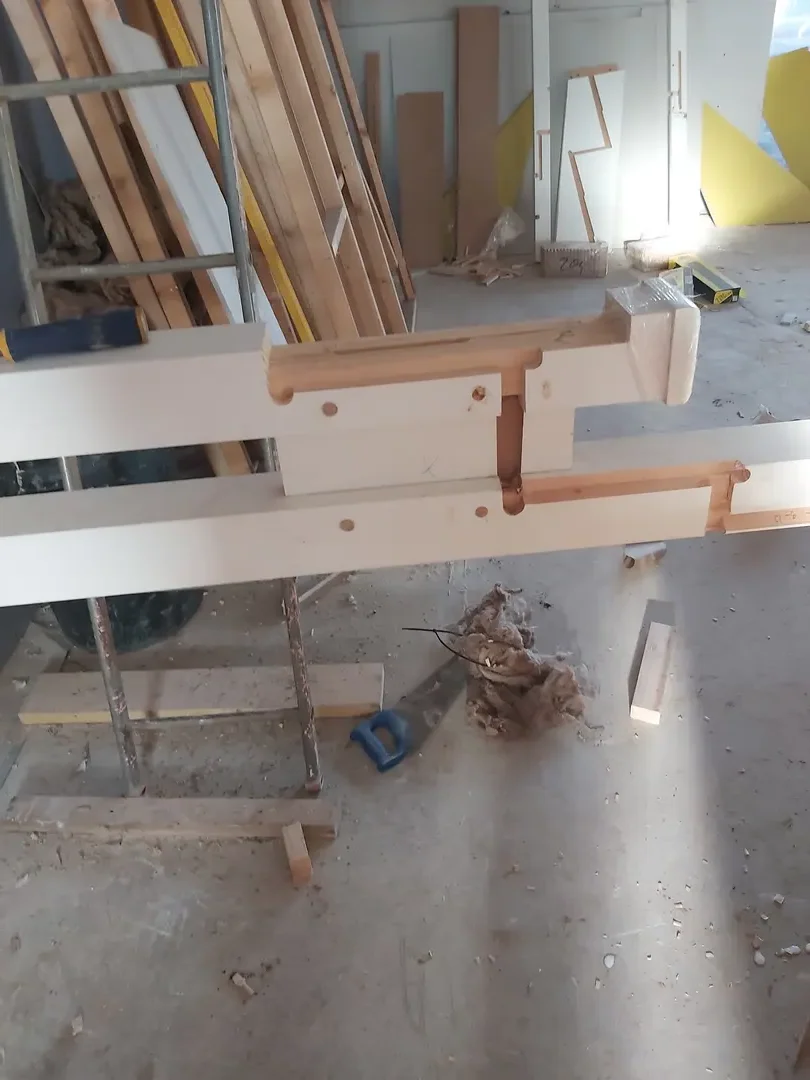 Timber staircase under construction inside a residential property