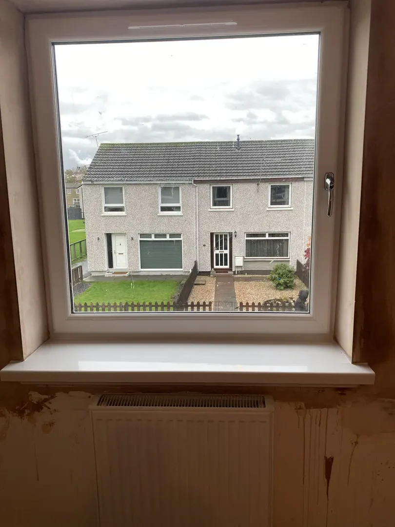 Finished internal window opening with fitted timber cill