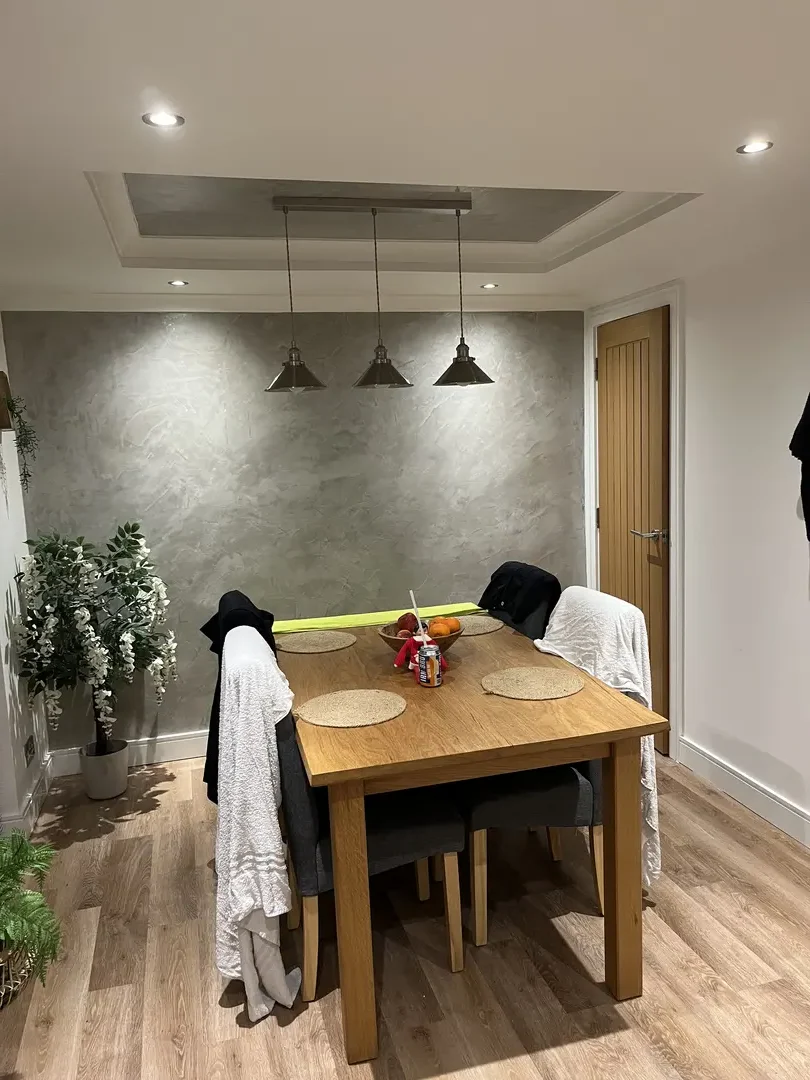 Finished dining area with joinery, flooring and recessed lighting