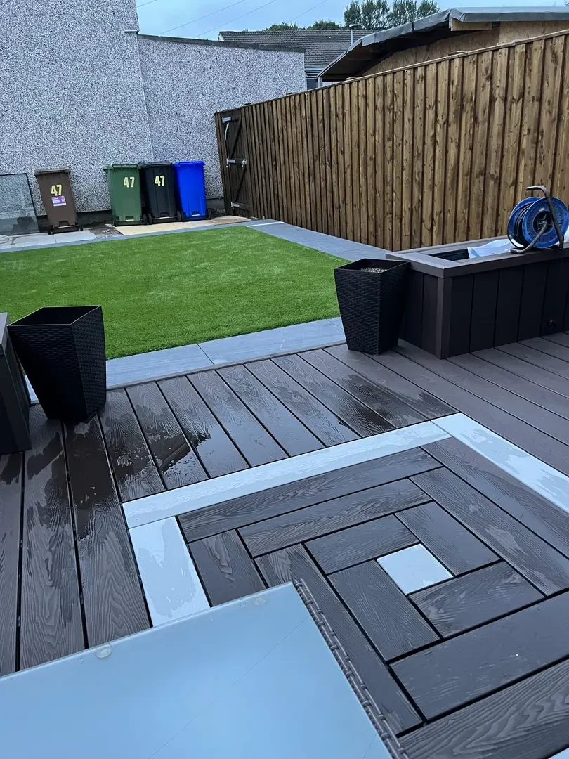 Finished composite garden decking with contrasting border detail