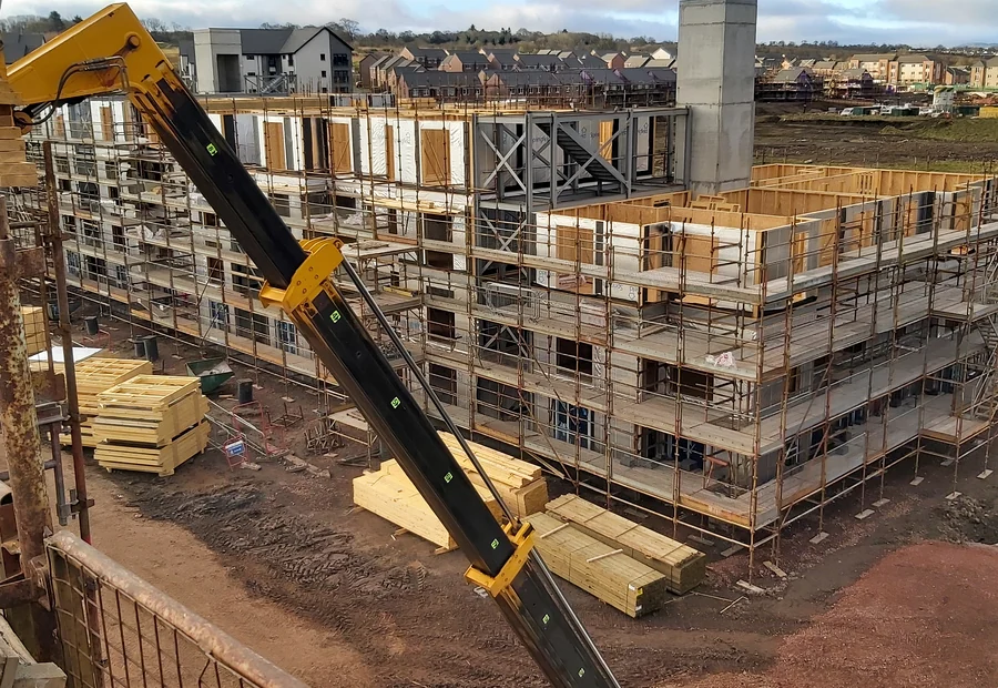 Timber frame under construction on a housing site