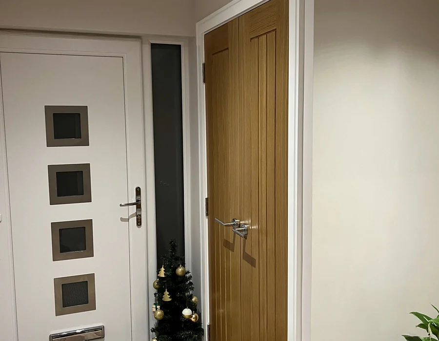 Fitted internal and external doors in a finished hallway